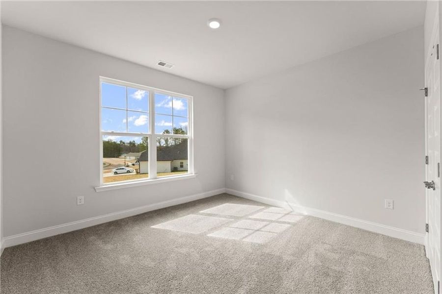 Spacious, unfurnished interior of a new home in Wood Creek Landing, Leland (Image 26).