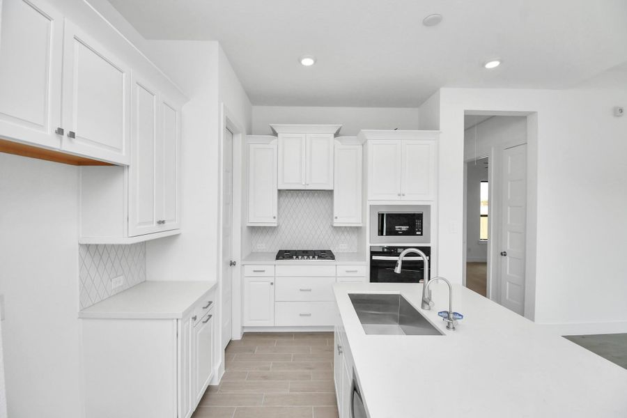 Furnished interior view inside a new home in Arabella on the Prairie: Signature Collection, Richmond (Image 12).