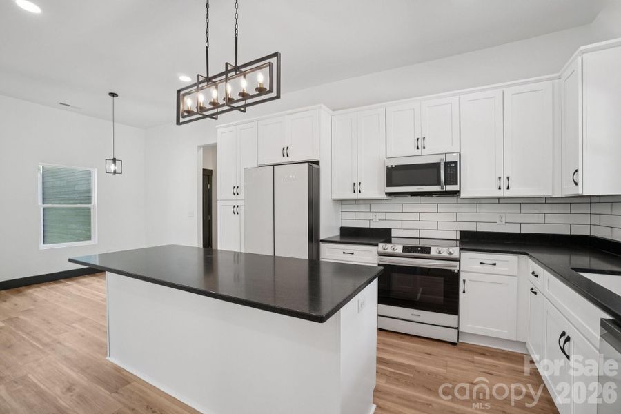 Furnished interior view inside a new home in , Hendersonville (Image 9).