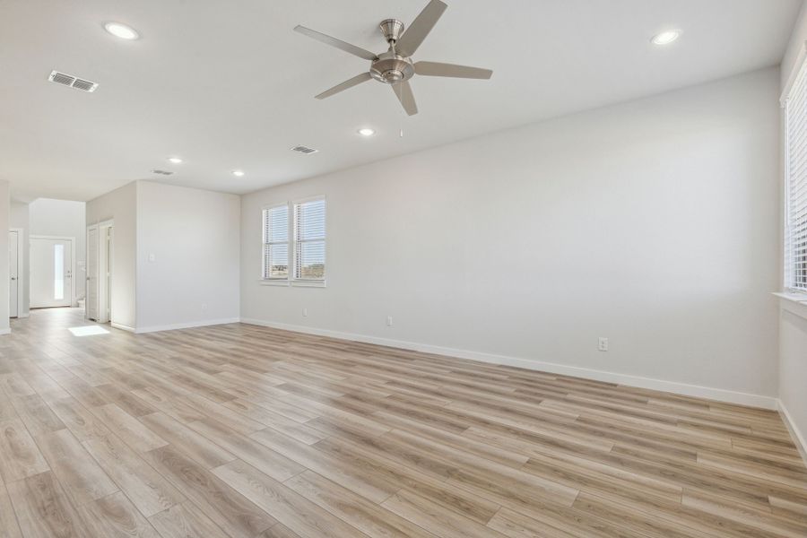 Living Room in the Willow home plan by Trophy Signature Homes – REPRESENTATIVE PHOTO