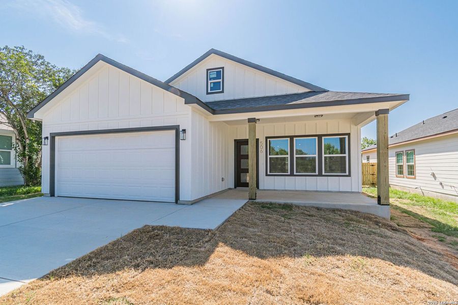 Front exterior of a new home in , Jourdanton, TX, highlighting curb appeal (Image 2). Front exterior of a new home in , Jourdanton, TX, highlighting curb appeal (Image 2).