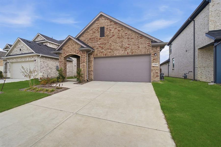 Front exterior of a new home in Westridge, McKinney, TX, highlighting curb appeal (Image 2).
