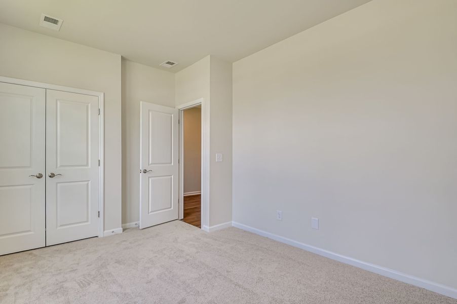 Spacious, unfurnished interior of a new home in The Beacon at Old Peachtree Single Family Homes, Lawrenceville (Image 29).