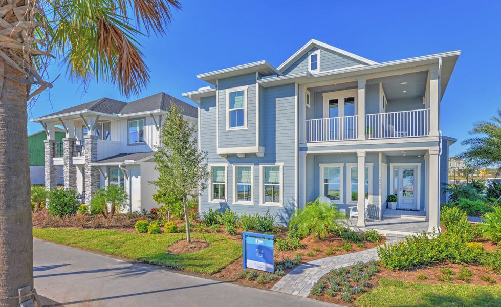 Front exterior of a new home in Laureate Park, Orlando, FL, highlighting curb appeal (Image 2).