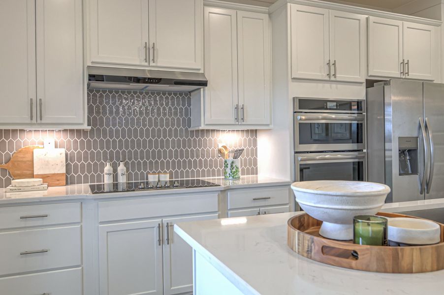 *Photo of example Model Home. Selections and finishes may vary. *Photo of example Model Home. Selections and finishes may vary.