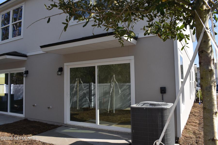 Exterior details and patio area of a home in Irongate Villas, Jacksonville (Image 3).