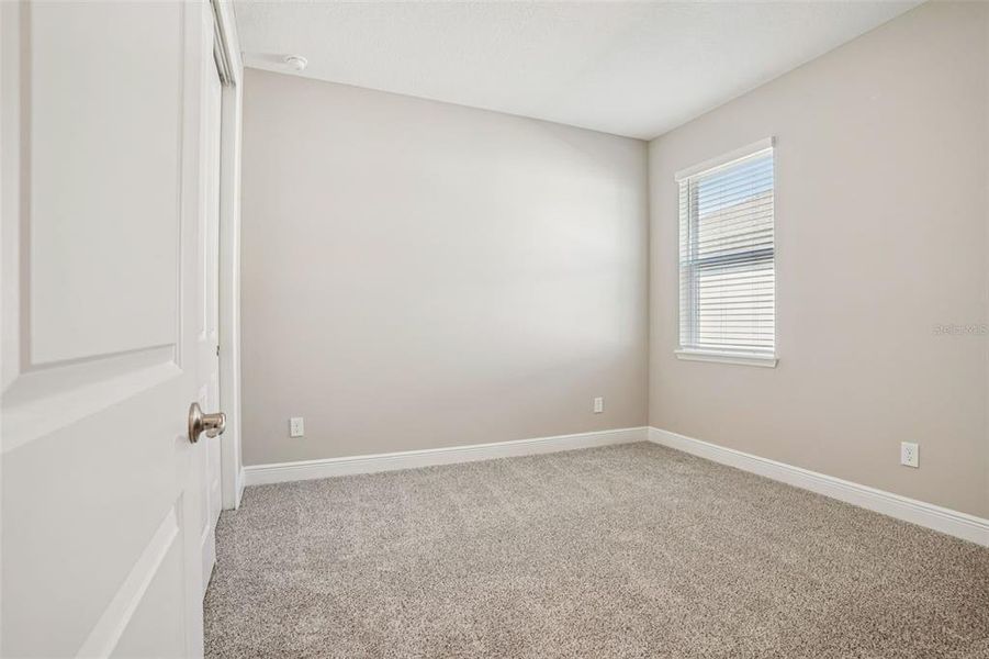 Spacious, unfurnished interior of a new home in Legends Preserve - Signature Series, Daytona Beach (Image 36).