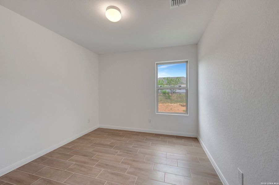 Spacious, unfurnished interior of a new home in Chaparral Ranch, Floresville (Image 40).