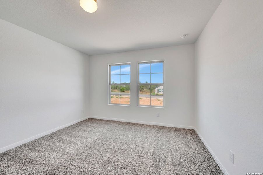 Spacious, unfurnished interior of a new home in Chaparral Ranch, Floresville (Image 19).