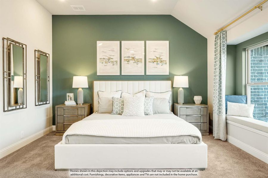 Bedroom with green accent wall, vaulted ceiling, king bed, and window seat Bedroom with green accent wall, vaulted ceiling, king bed, and window seat