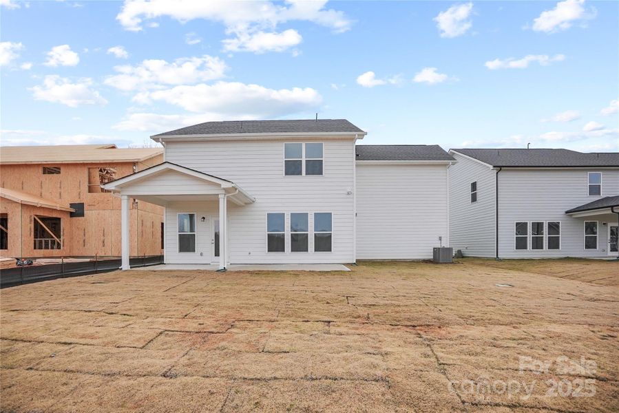 Exterior details and patio area of a home in Forest Creek, Waxhaw (Image 6).