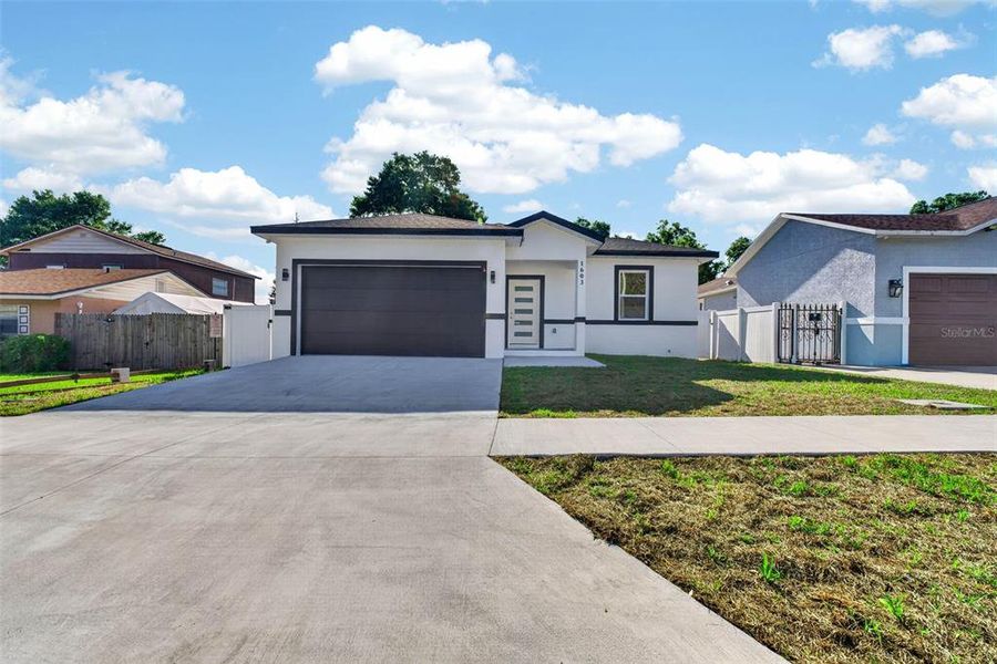 Front exterior of a new home in , Lakeland, FL, highlighting curb appeal (Image 26). Front exterior of a new home in , Lakeland, FL, highlighting curb appeal (Image 26).