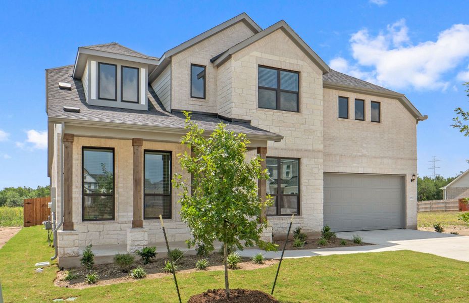 Representative exterior photo of a completed home built from the Ferris by Pulte Homes in Kuempel Estates, Pflugerville, TX (Image 27). Representative exterior photo of a completed home built from the Ferris by Pulte Homes in Kuempel Estates, Pflugerville, TX (Image 27).