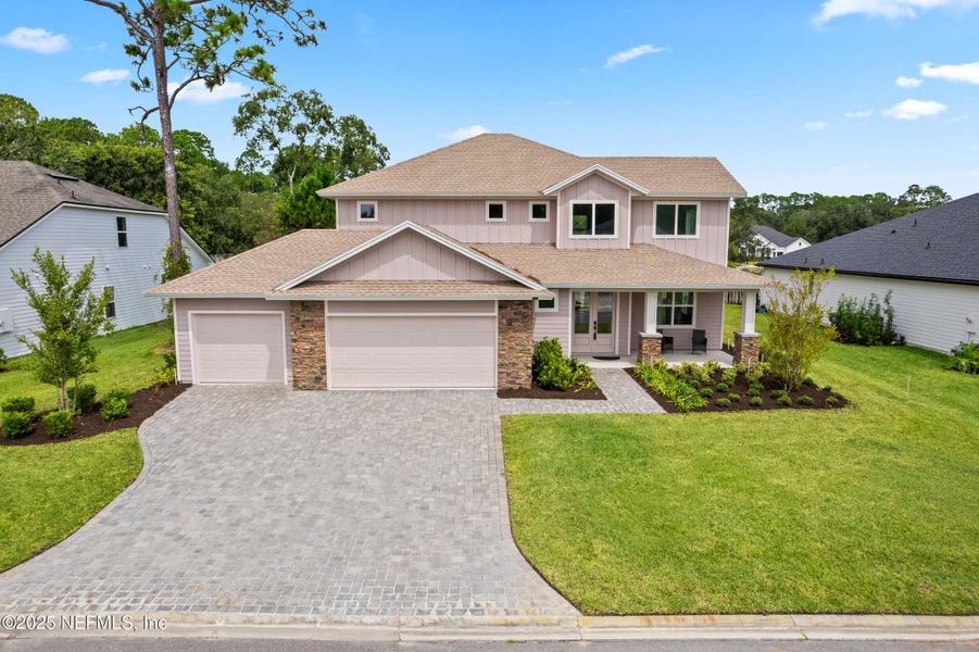 Front exterior of a new home in , Jacksonville, FL, highlighting curb appeal (Image 25). Front exterior of a new home in , Jacksonville, FL, highlighting curb appeal (Image 25).