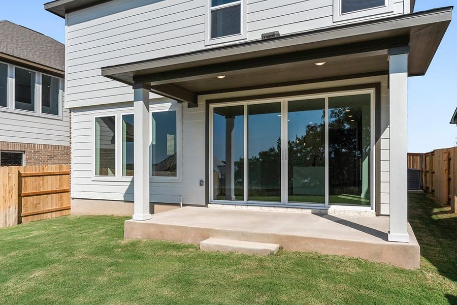 Exterior details and patio area of a home in Terrace Collection at Lariat, Liberty Hill (Image 26). Exterior details and patio area of a home in Terrace Collection at Lariat, Liberty Hill (Image 26).