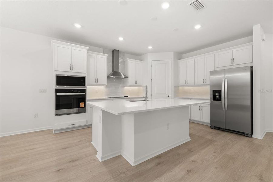 Furnished interior view inside a new home in Serenade at Ovation, Winter Garden (Image 7). Furnished interior view inside a new home in Serenade at Ovation, Winter Garden (Image 7).