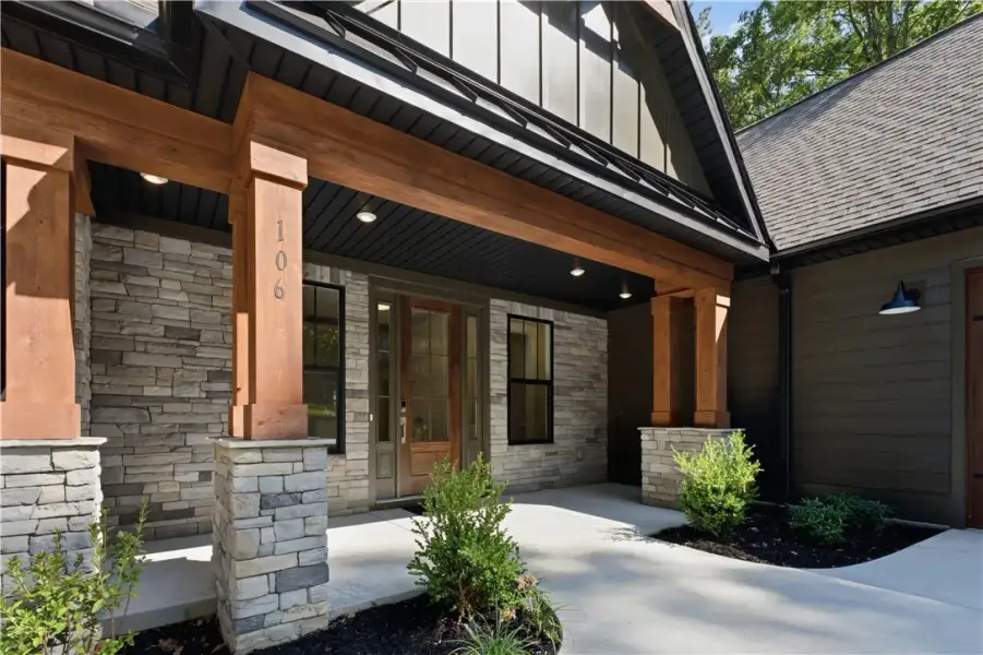 Natural stone and heavy timbers frame the welcomin