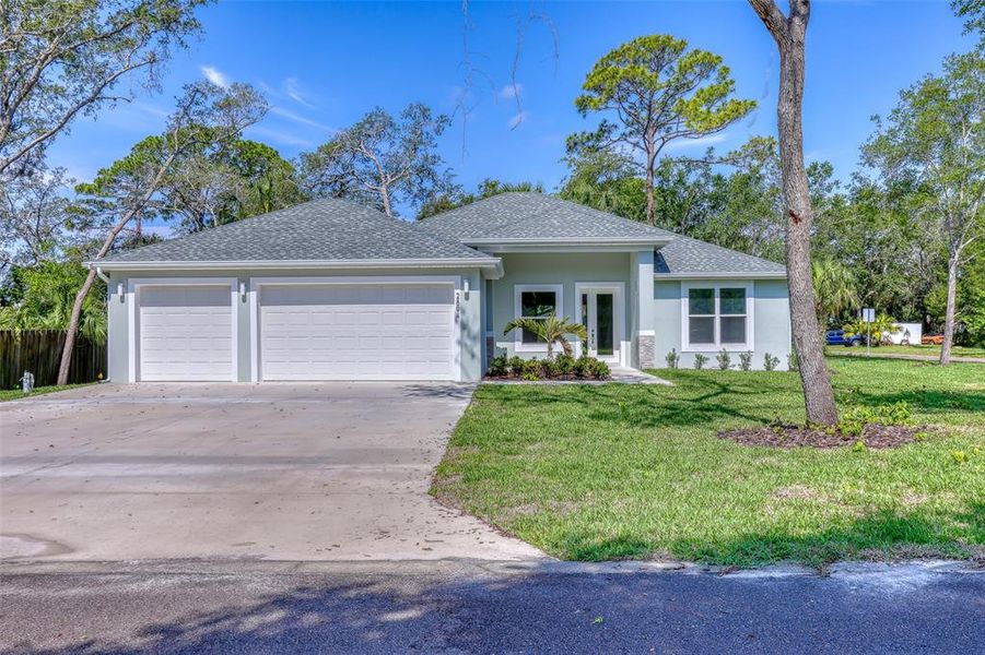 Front exterior of a new home in , New Smyrna Beach, FL, highlighting curb appeal (Image 28).