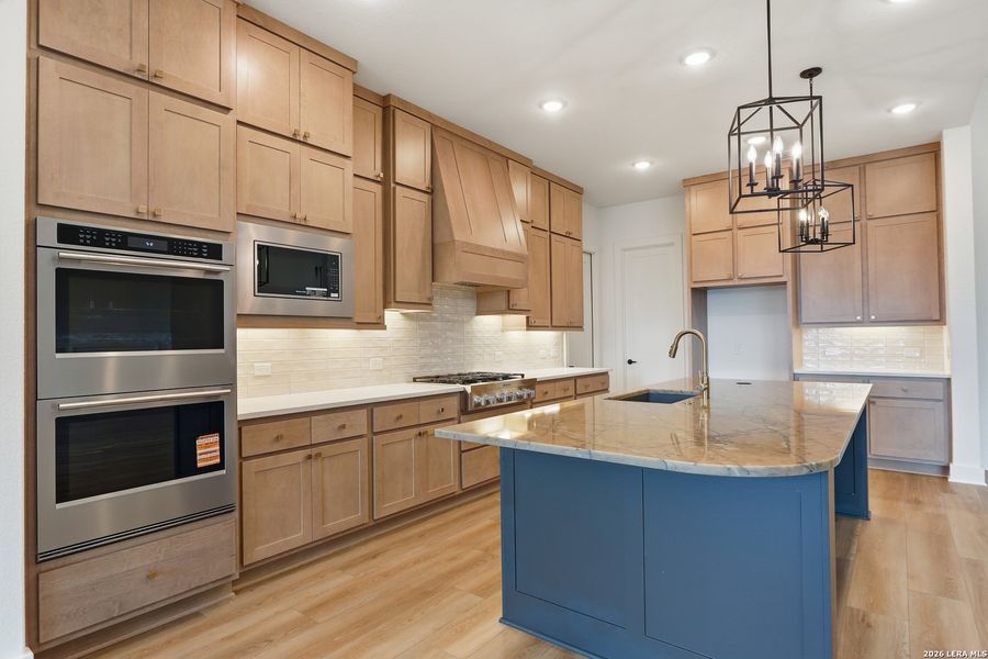 Furnished interior view inside a new home in Enchanted Bluff, San Antonio (Image 10).