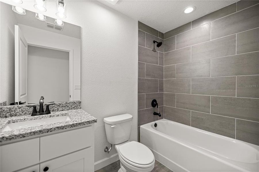 Furnished interior view inside a new home in , Dunnellon (Image 6).