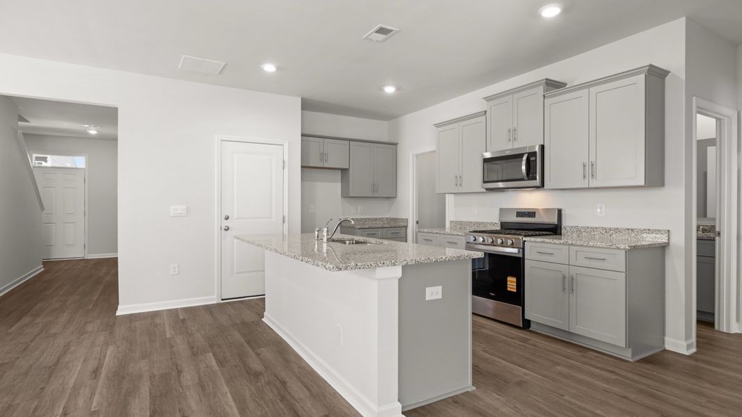 Representative furnished interior of a home built from the Robie by D.R. Horton in Highland Hills, Graniteville (Image 5).