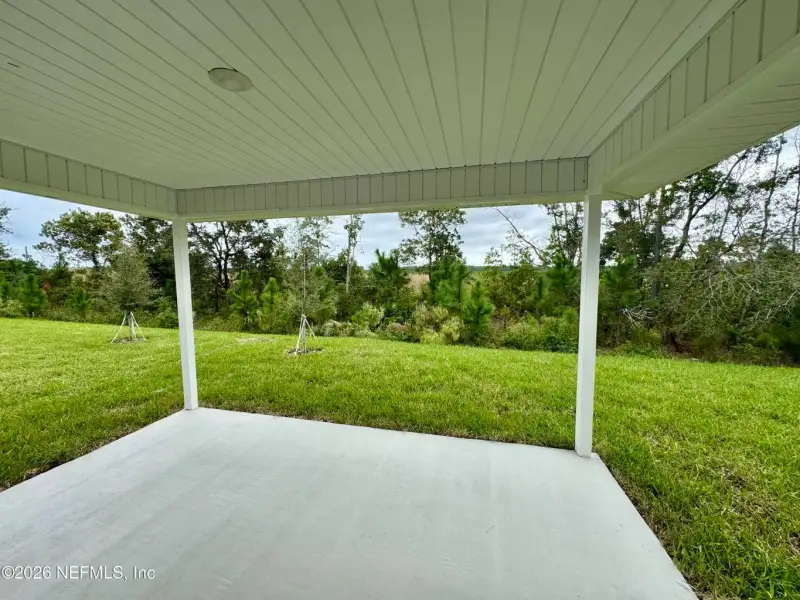 Exterior details and patio area of a home in Shadow Crest at Rolling Hills, Green Cove Springs (Image 3).