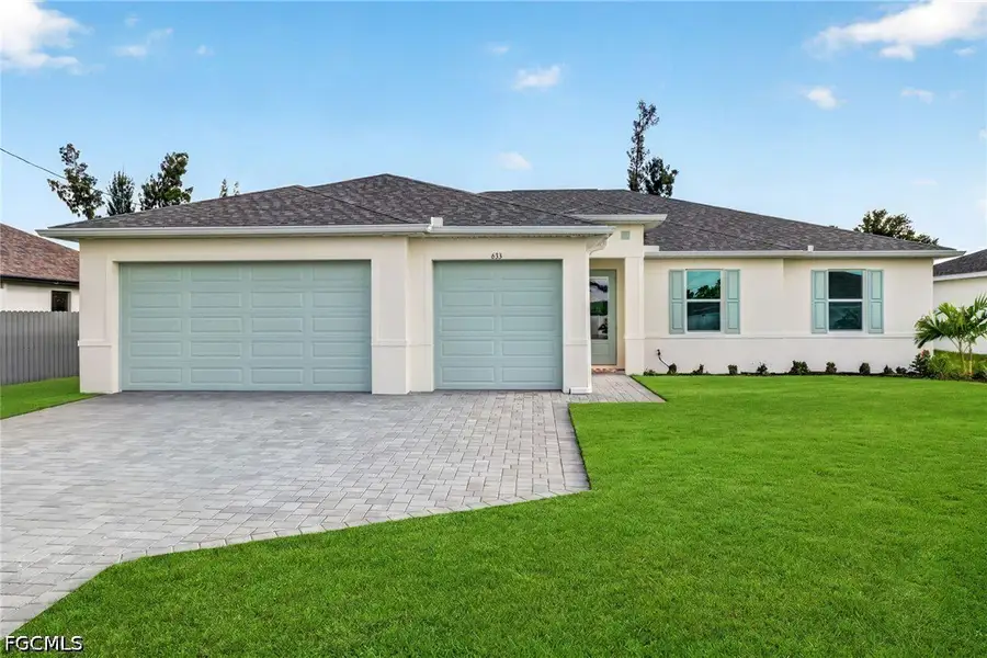 Front exterior of a new home in Cape Coral, Cape Coral, FL, highlighting curb appeal (Image 1). Front exterior of a new home in Cape Coral, Cape Coral, FL, highlighting curb appeal (Image 1).
