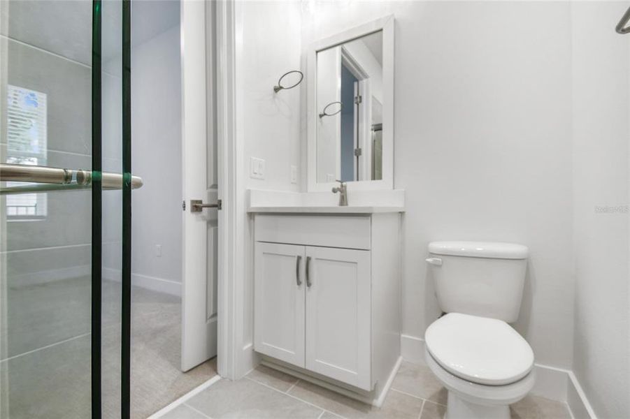 Furnished interior view inside a new home in Towns at Union, St. Petersburg (Image 18).