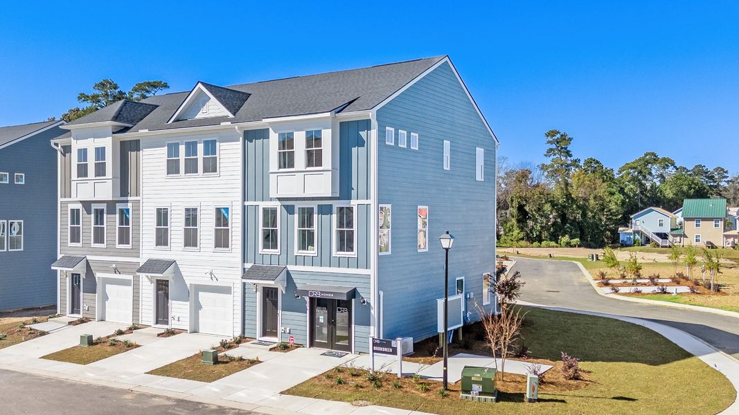 Front exterior of a new home in Seabreeze Crossing, Little River, SC, highlighting curb appeal (Image 1). Front exterior of a new home in Seabreeze Crossing, Little River, SC, highlighting curb appeal (Image 1).