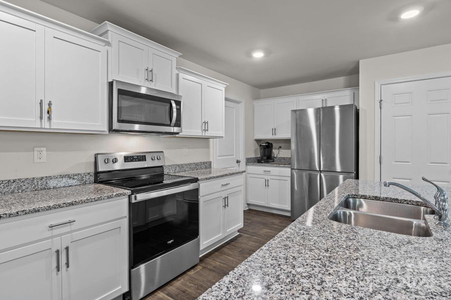 Furnished interior view inside a new home in Mills at Long Creek, Dallas (Image 13).