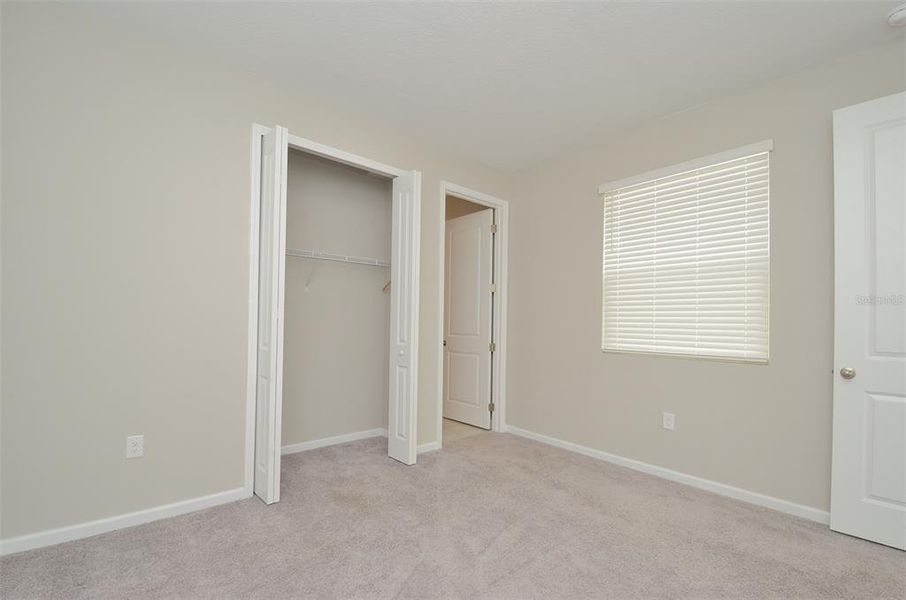 Spacious, unfurnished interior of a new home in Seasons at Eden Hills, Lake Alfred (Image 33).