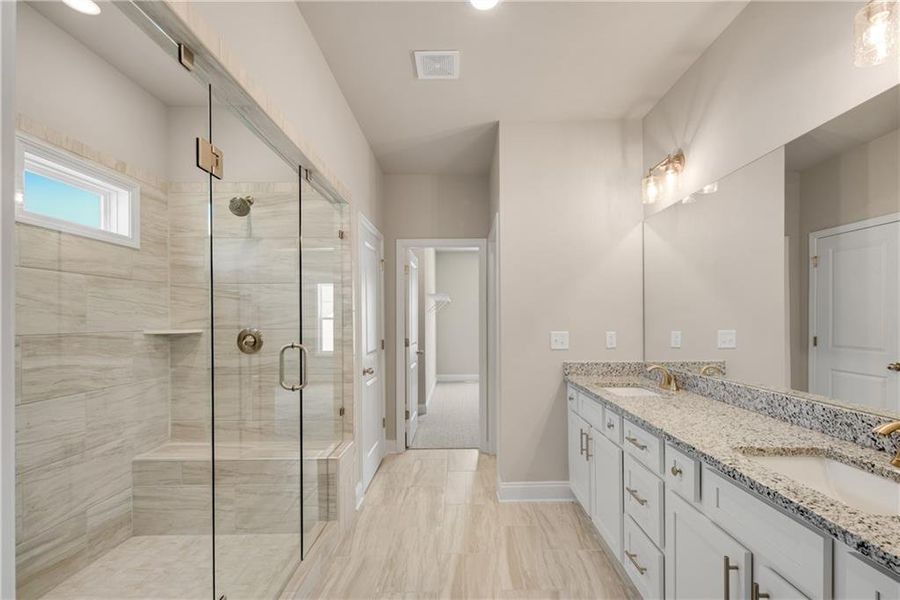 Furnished interior view inside a new home in Hidden Fields, Hoschton (Image 12).