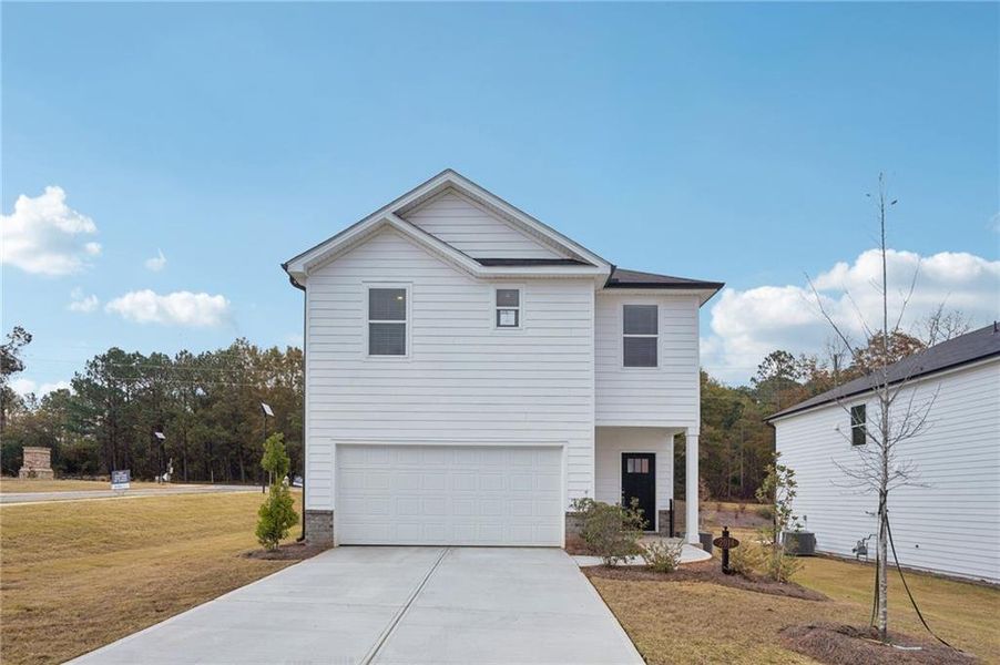 Front exterior of a new home in Avalon - Reserve Series, Conyers, GA, highlighting curb appeal (Image 2).