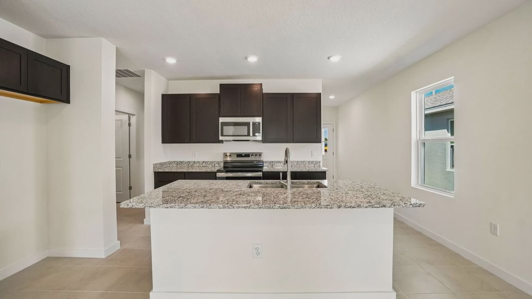 Furnished interior view inside a new home in Willowbrook North, Winter Haven (Image 15).