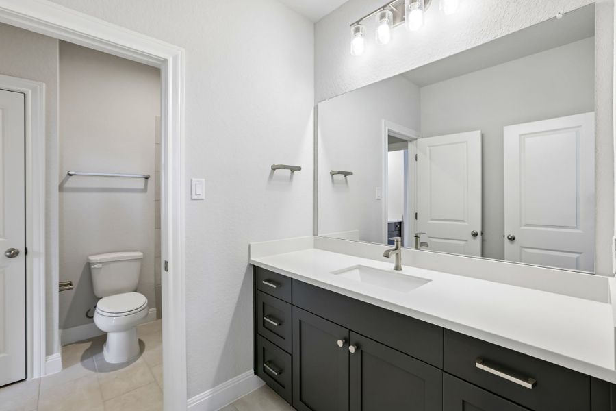 Furnished interior view inside a new home in 6 Creeks, Kyle (Image 12).