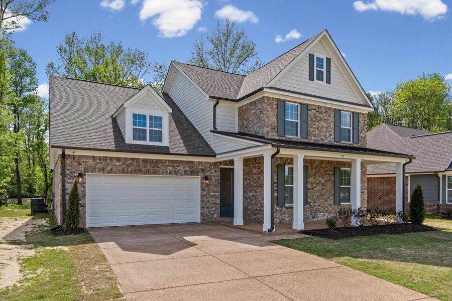 View of front of house with covered porch, brick siding, concrete driveway, and roof with shingles View of front of house with covered porch, brick siding, concrete driveway, and roof with shingles
