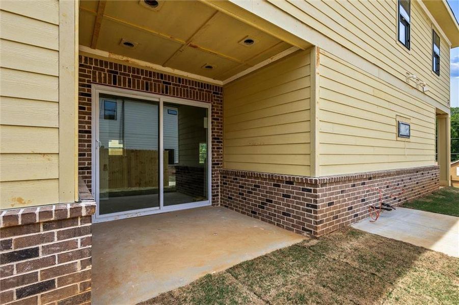 Exterior details and patio area of a home in , Rex (Image 2). Exterior details and patio area of a home in , Rex (Image 2).