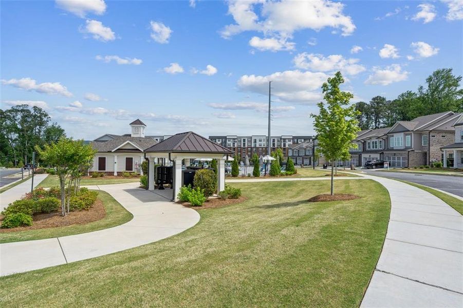 Front exterior of a new home in Brackley Single Family, Cumming, GA, highlighting curb appeal (Image 30).
