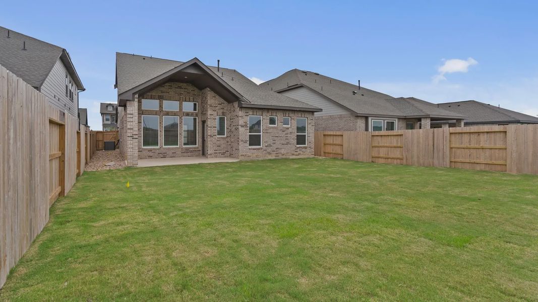 Exterior details and patio area of a home in Wildrye 45', Waller (Image 4).