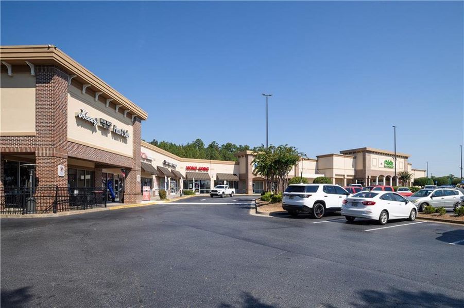 Front exterior of a new home in Riverside Ridge, Lawrenceville, GA, highlighting curb appeal (Image 19).