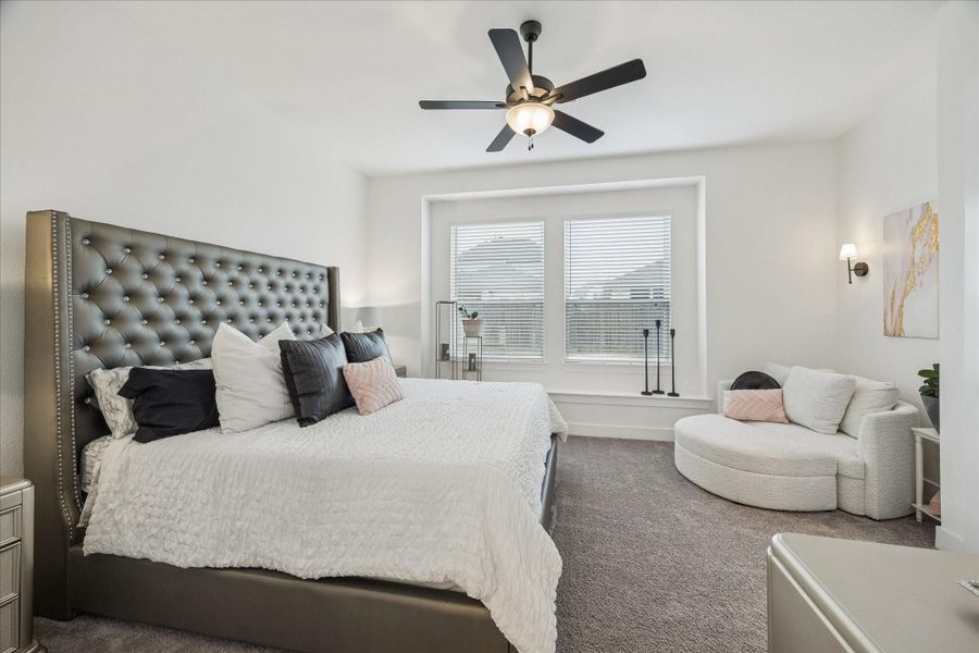 Primary bedroom with extra room for seating