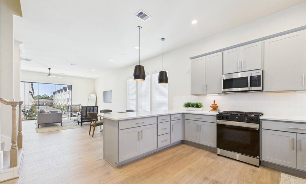 Discover the beautiful open concept style 2nd floor kitchen with views to the living room with great natural light