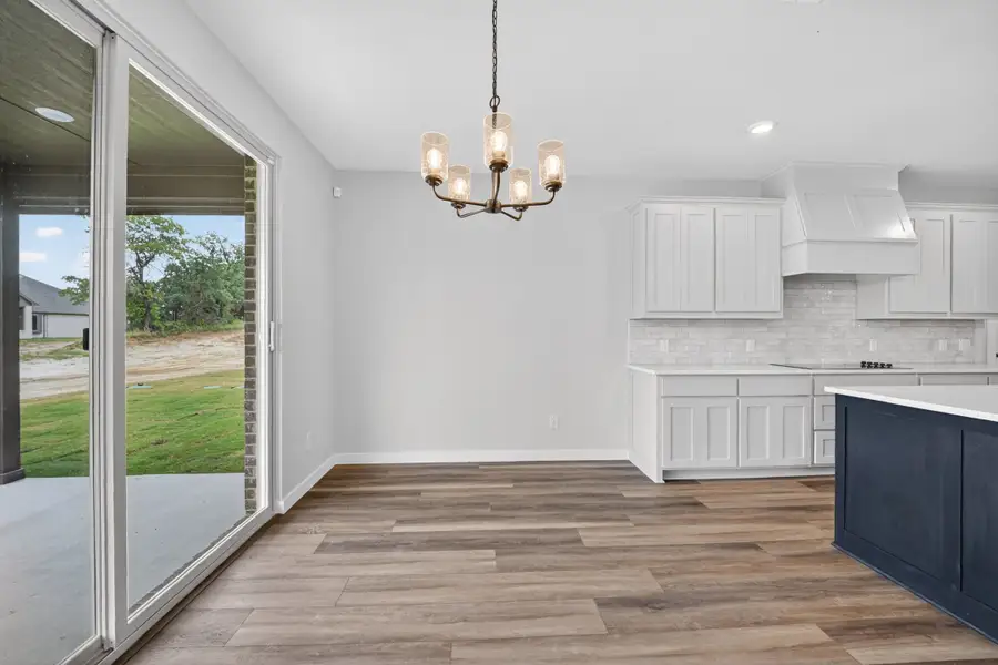 Representative unfurnished interior of a home built from the Garrison III by Cheldan Homes in Arbor Oaks, Boyd (Image 35).