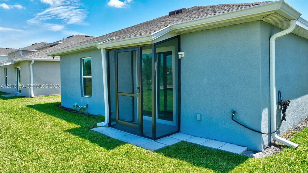 Exterior details and patio area of a home in , Lehigh Acres (Image 3).