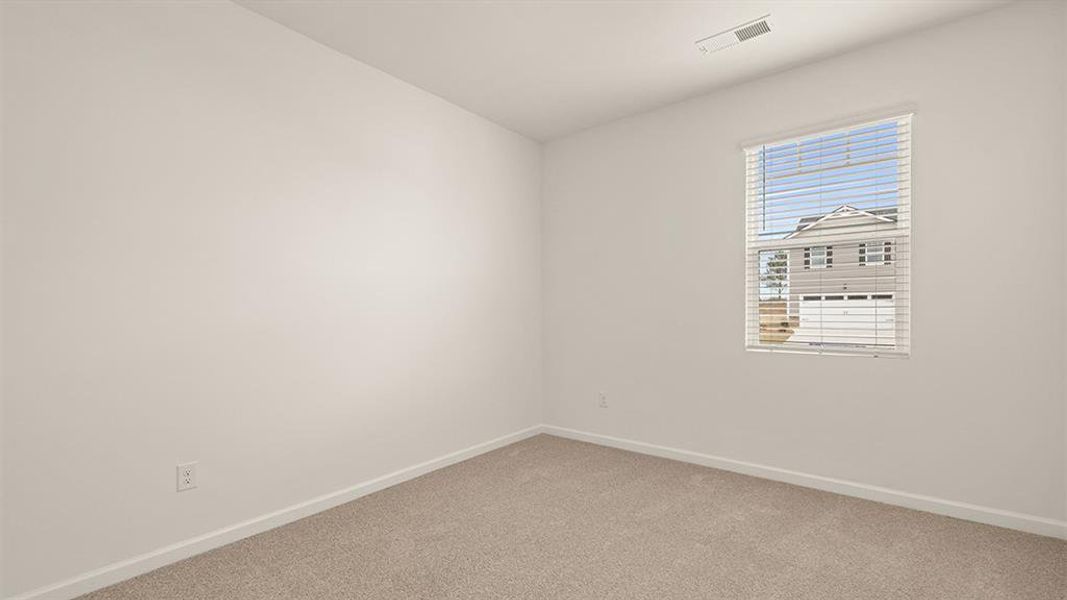 Spacious, unfurnished interior of a new home in Preserve at Dove Creek, Statham (Image 34).