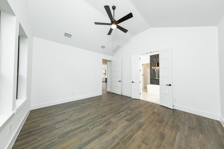 Additional view from primary bedroom looking towards the double door entrance to primary ensuite bathroom.