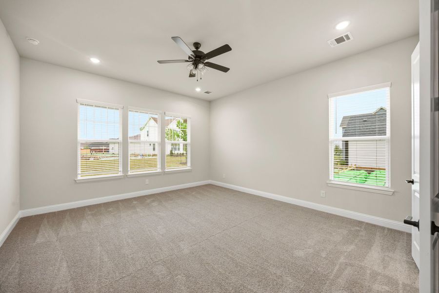 Representative unfurnished interior of a home built from the Peyton III by Cambridge Homes in Lake Park, Rowlett (Image 15).