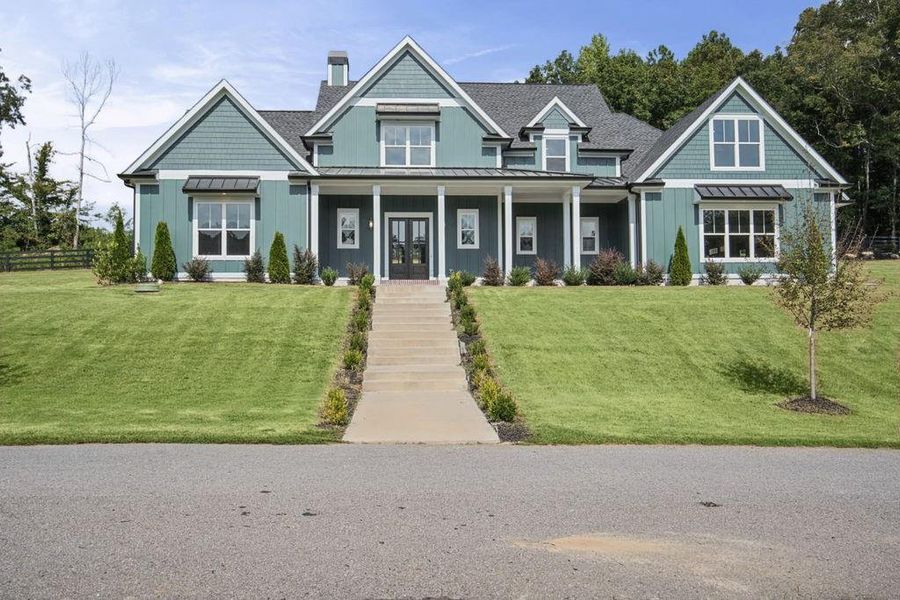 Front exterior of a new home in , Dacula, GA, highlighting curb appeal (Image 30). Front exterior of a new home in , Dacula, GA, highlighting curb appeal (Image 30).