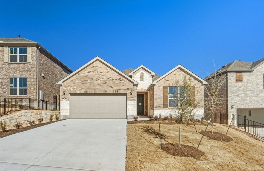 Front exterior of a new home in West Cypress Hills, Spicewood, TX, highlighting curb appeal (Image 22).