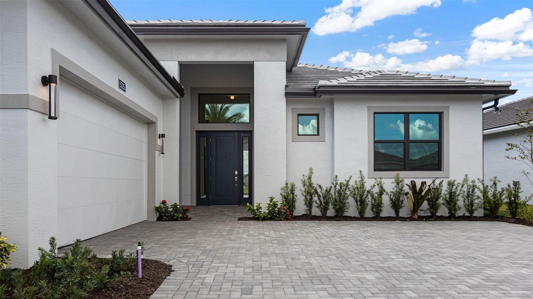 Exterior details and patio area of a home in Cresswind Palm Beach at Westlake, Westlake (Image 26). Exterior details and patio area of a home in Cresswind Palm Beach at Westlake, Westlake (Image 26).